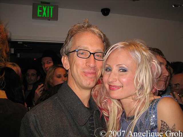 Andy Dick and Natalia Fabia standing together.